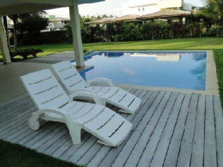 Casa de temporada em Guarajuba, Camacari Bahia. Casa Frente mar Guarajuba - Pé na areia - 54 com piscina e churrasqueira