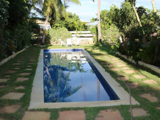 Casa de temporada em Guarajuba, Camacari Bahia. Casa ampla - Cinco quartos com ar - Piscina com raia - Espaco gourmet - Praia do porto - Guarajuba